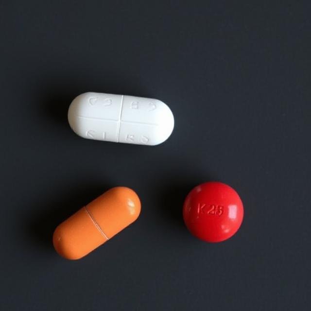 Variety of pills, including K 25 oval pill.